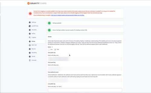 Omise add on settings in Gravity Forms: mode, public and secret keys, webhook secret and webhook URL